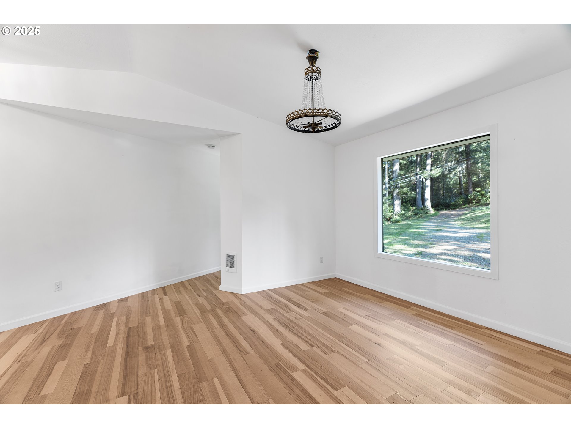 95708 Horton Lane Brookings, OR 97415 - Photo 10 of 46 a view of an empty room with a window