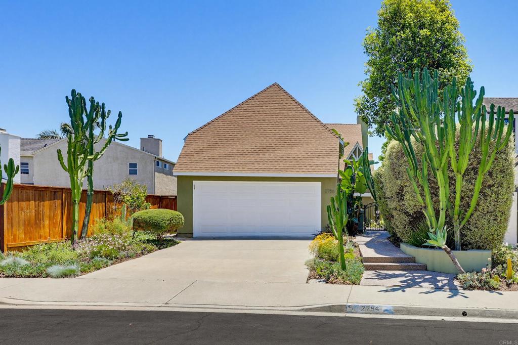 2756 Southampton Road Carlsbad, CA 92010 - Photo 25 of 40 a front view of a house with a yard and garage