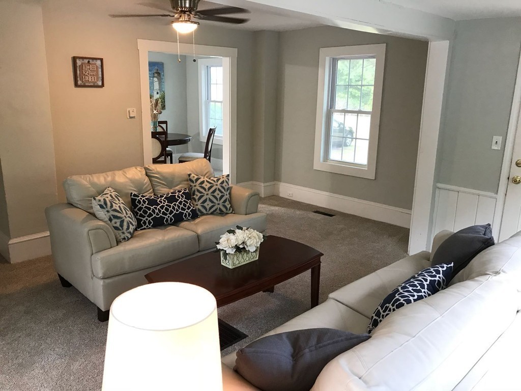 77 Wareham Road Marion, MA 02738 - Photo 8 of 27 a living room with furniture and a potted plant