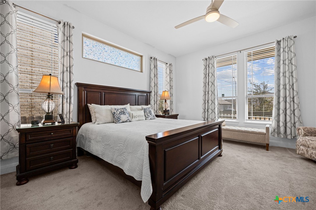 3009 Sage Ranch Drive Leander, TX 78641 - Photo 27 of 43 a bed room with a bed and a window