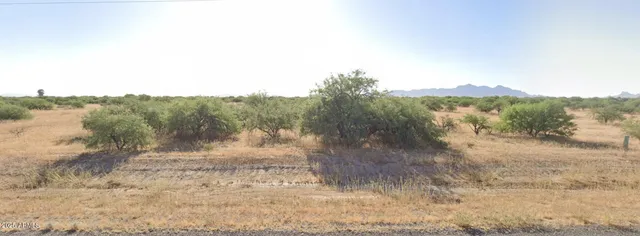 a view of mountain view with mountains in the background