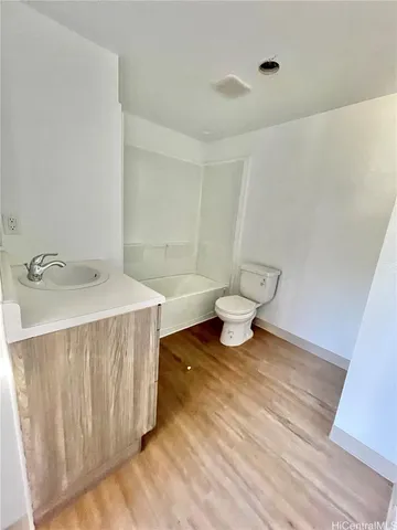 a bathroom with a sink and a toilet