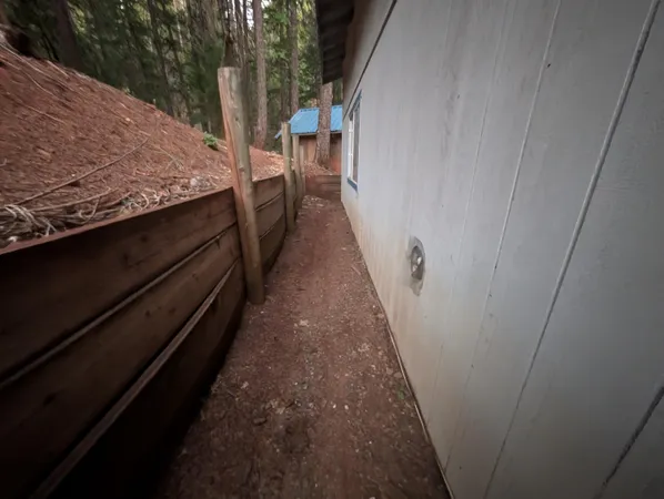 a view of a backyard of the house
