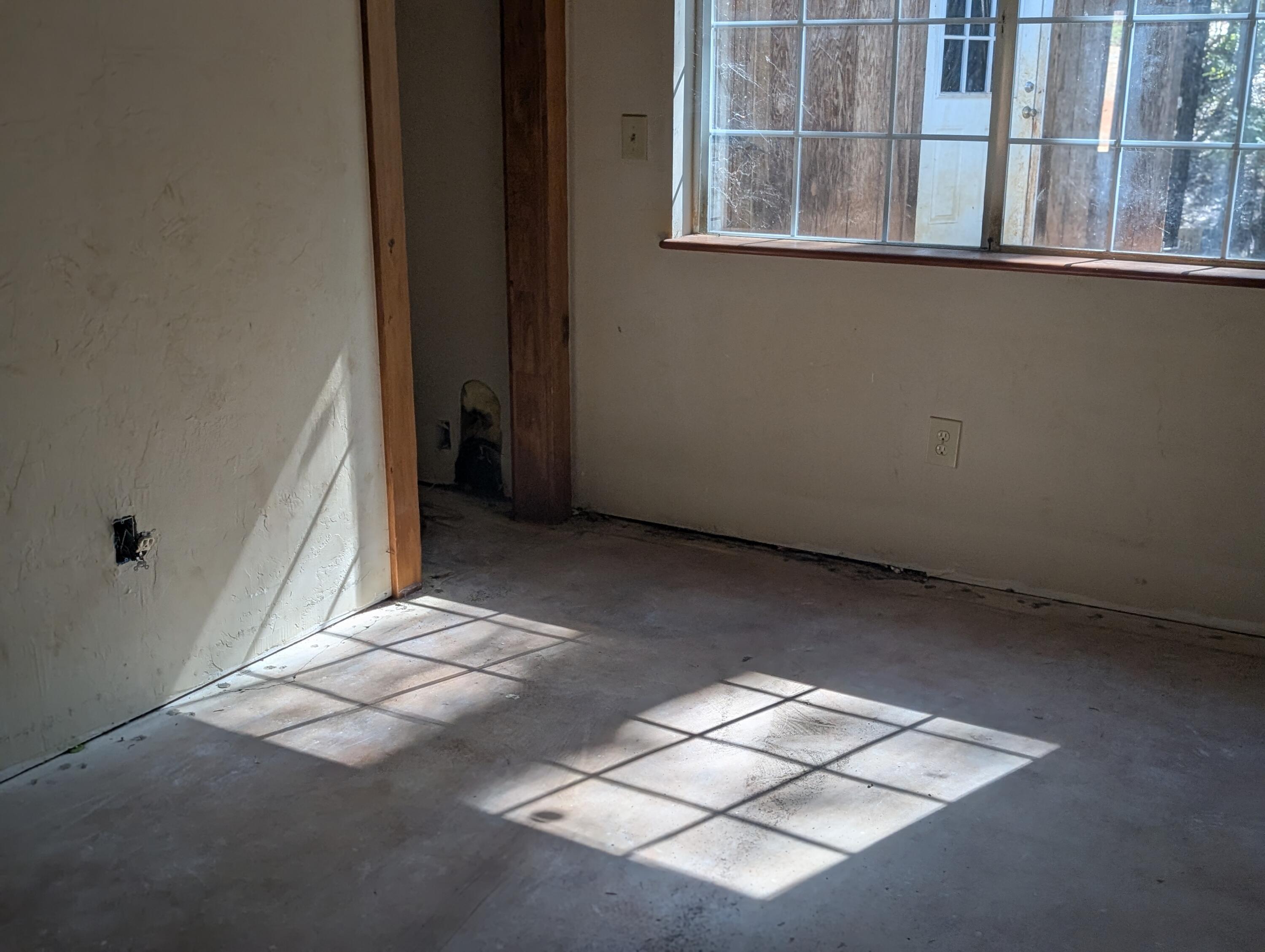 211 Goa Way Lewiston, CA 96052 - Photo 19 of 44 an empty room with windows