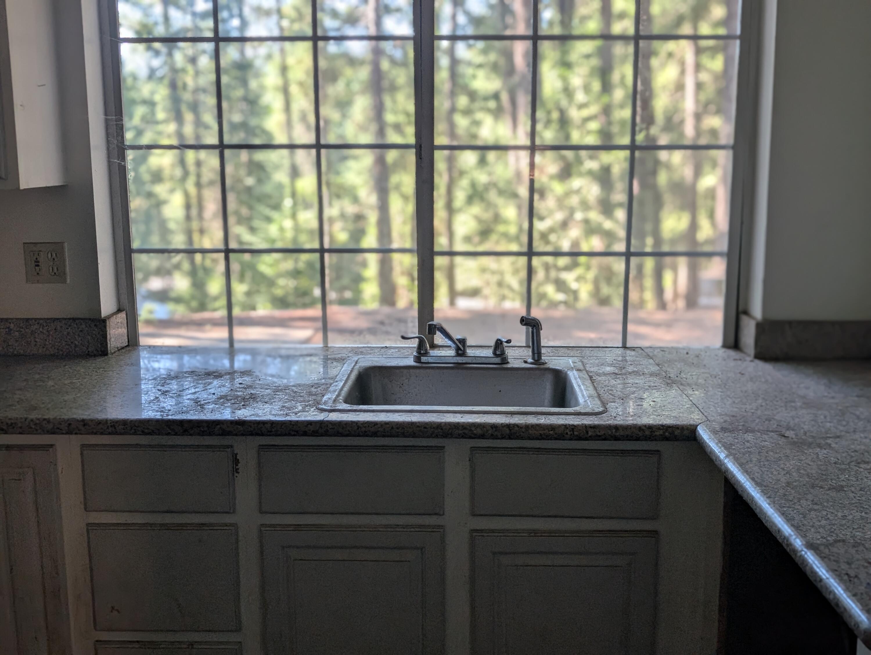 211 Goa Way Lewiston, CA 96052 - Photo 30 of 44 a kitchen with a sink and a window
