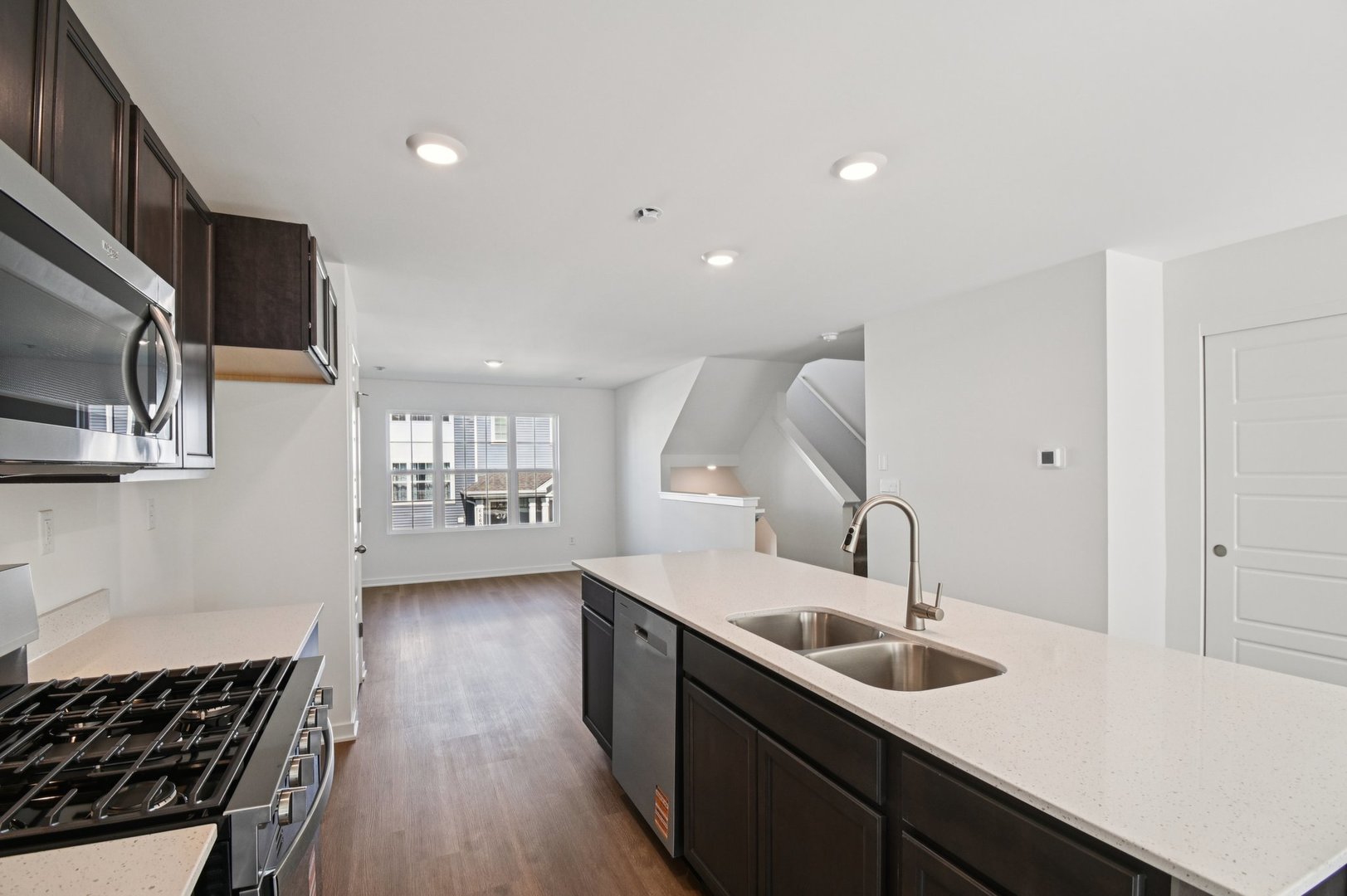 1433 Oakfield Lane Pingree Grove, IL 60140 - Photo 11 of 75 a kitchen with a sink stove and microwave