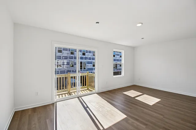 an empty room with closet area