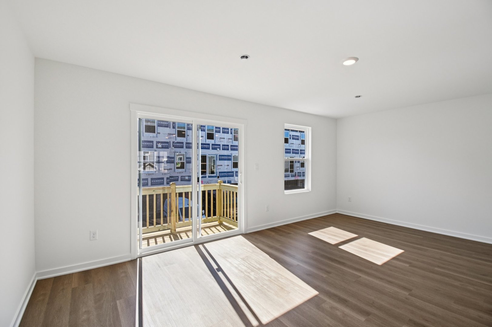 1433 Oakfield Lane Pingree Grove, IL 60140 - Photo 15 of 75 wooden floor in an empty room with a window