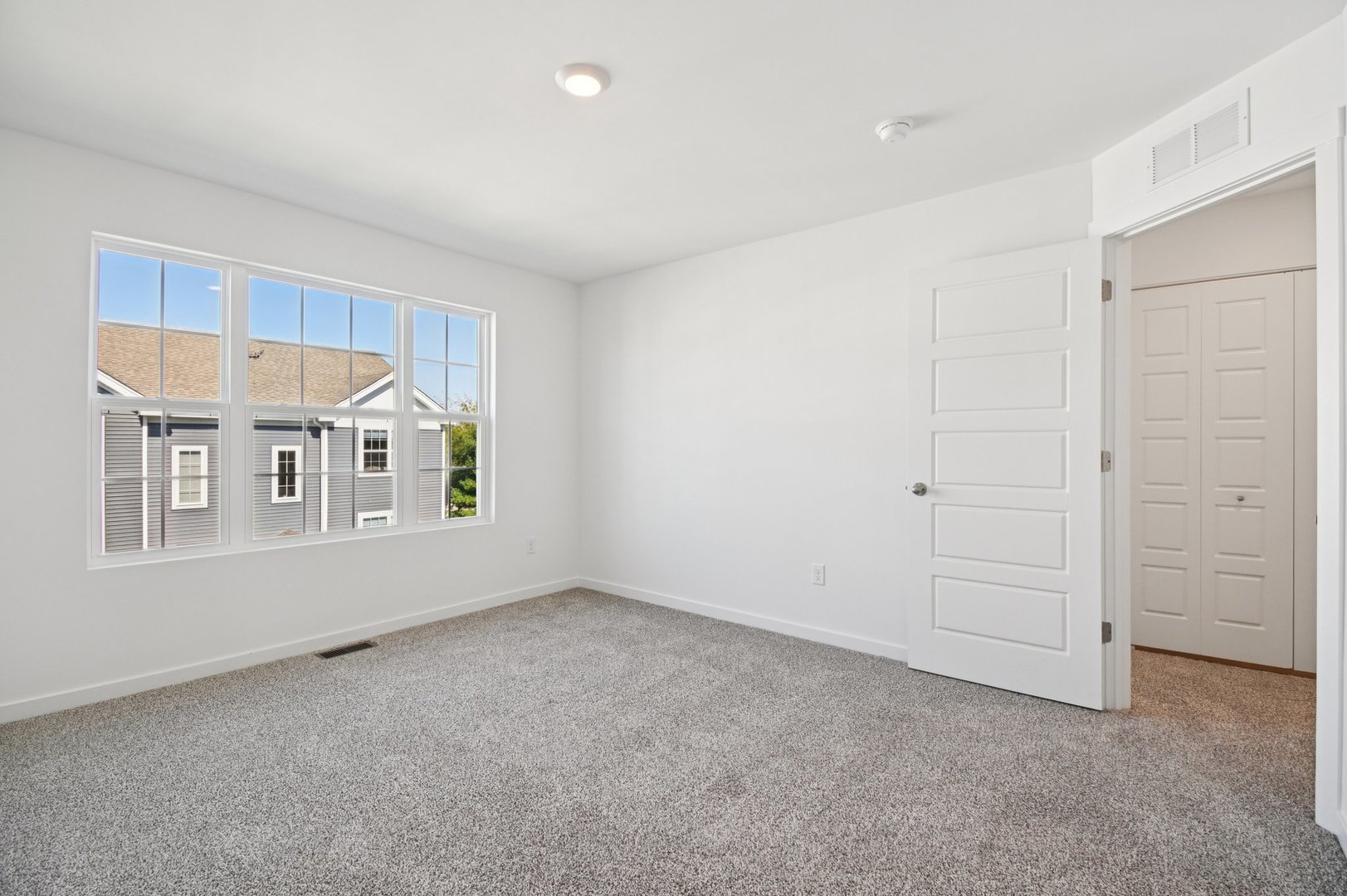 1433 Oakfield Lane Pingree Grove, IL 60140 - Photo 17 of 75 a view of an empty room with a window