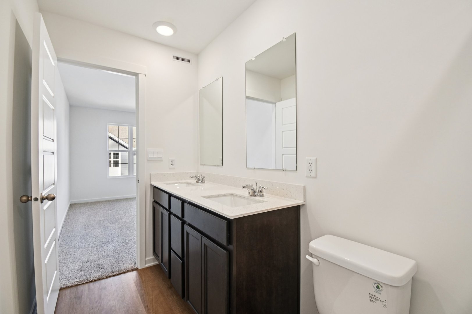 1433 Oakfield Lane Pingree Grove, IL 60140 - Photo 21 of 75 a bathroom with a sink a toilet and a mirror