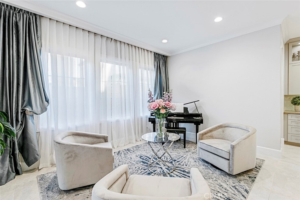 65 Rockinghorse Irvine, CA 92602 - Photo 12 of 43 a living room with furniture and a painting on the wall