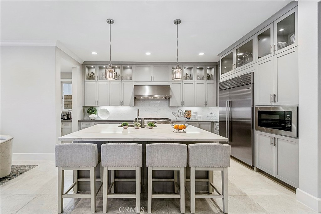 65 Rockinghorse Irvine, CA 92602 - Photo 15 of 43 a kitchen with cabinets and stainless steel appliances