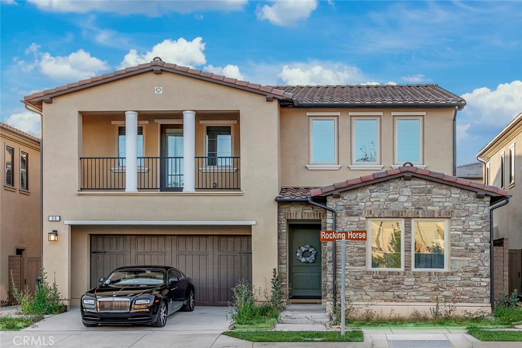 65 Rockinghorse Irvine, CA 92602 - Photo 3 of 43 a car parked in front of a house