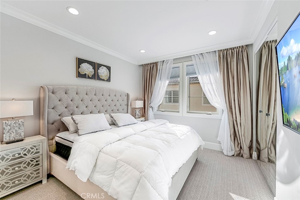 65 Rockinghorse Irvine, CA 92602 - Photo 33 of 43 a bedroom with bed and a window