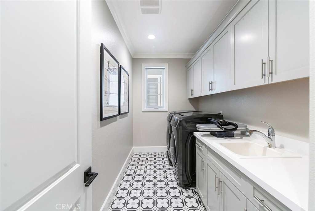 65 Rockinghorse Irvine, CA 92602 - Photo 39 of 43 a kitchen with a sink stove and refrigerator