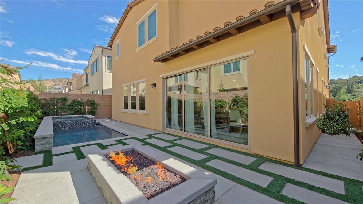 65 Rockinghorse Irvine, CA 92602 - Photo 40 of 43 a front view of a house with garden