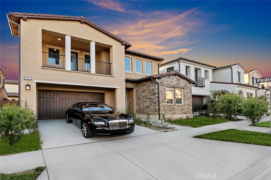 65 Rockinghorse Irvine, CA 92602 - Photo 4 of 43 a car parked in front of a house