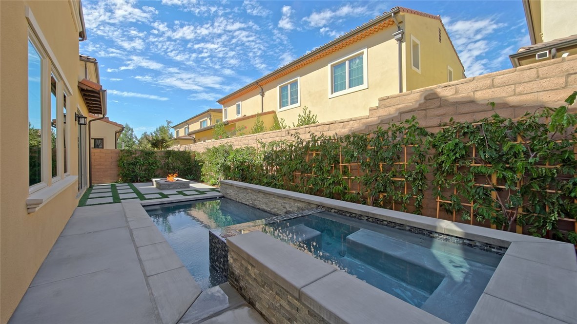 65 Rockinghorse Irvine, CA 92602 - Photo 41 of 43 a view of balcony with couch and wooden fence