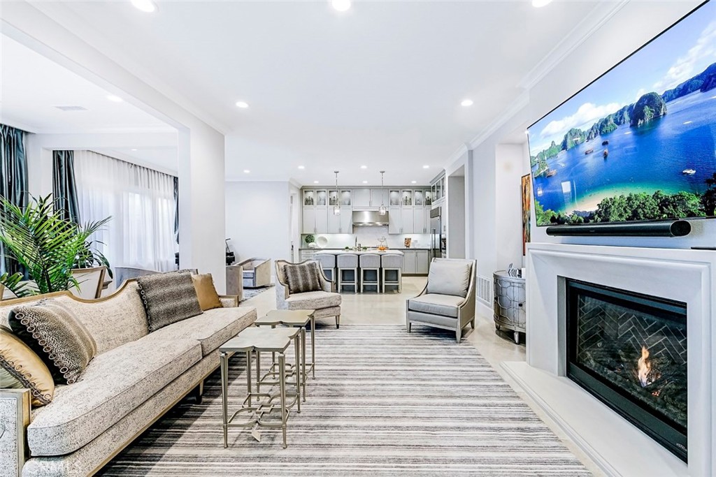 65 Rockinghorse Irvine, CA 92602 - Photo 9 of 43 a living room with furniture and a fireplace