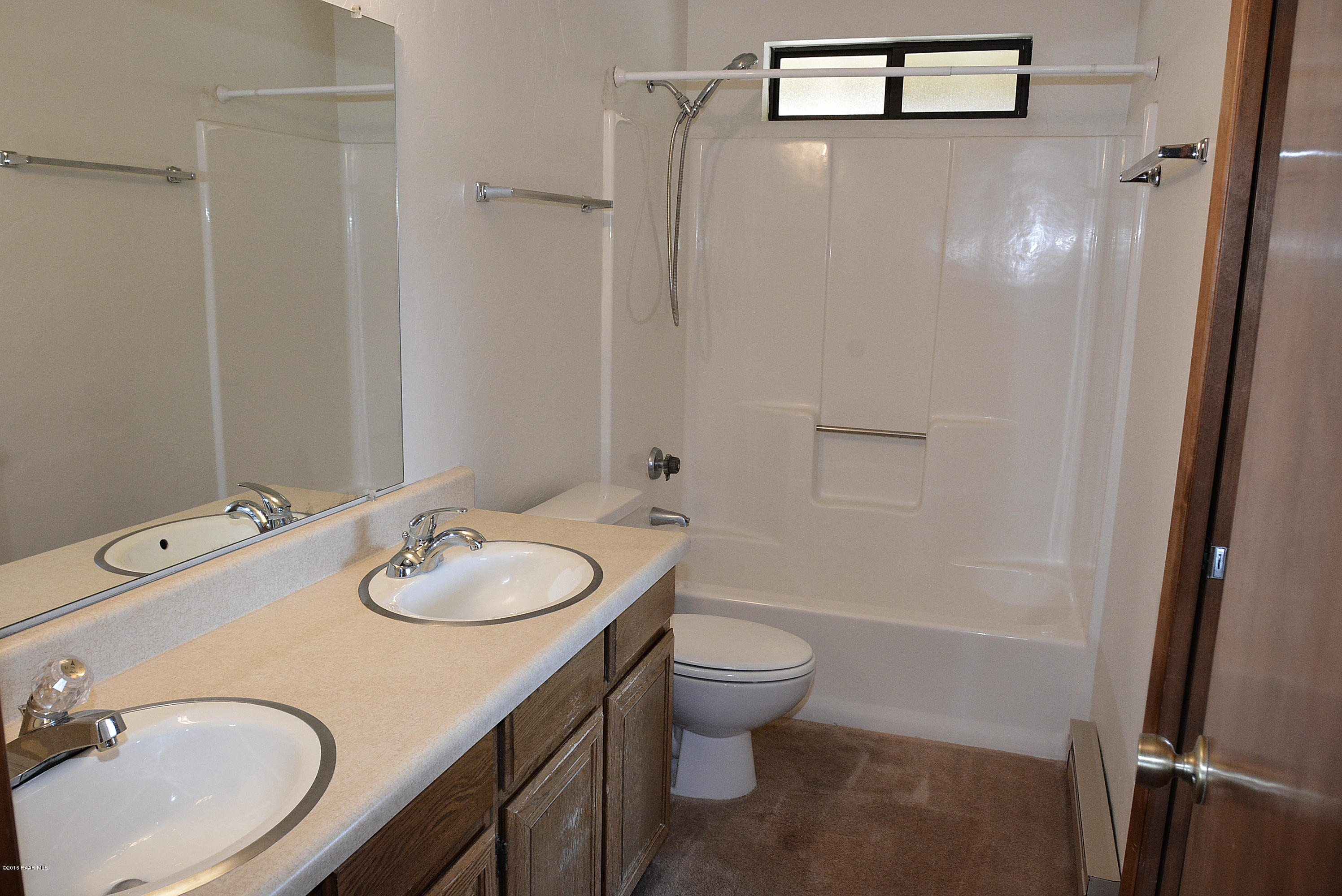 421 Buckskin Road Prescott, AZ 86301 - Photo 13 of 26 a bathroom with a sink toilet and shower