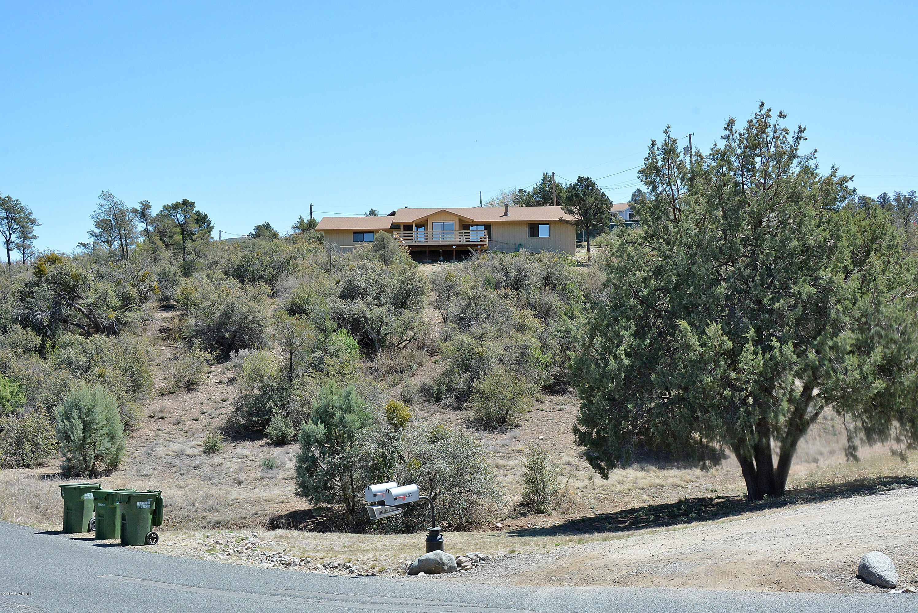421 Buckskin Road Prescott, AZ 86301 - Photo 23 of 26 a view of a house with a street