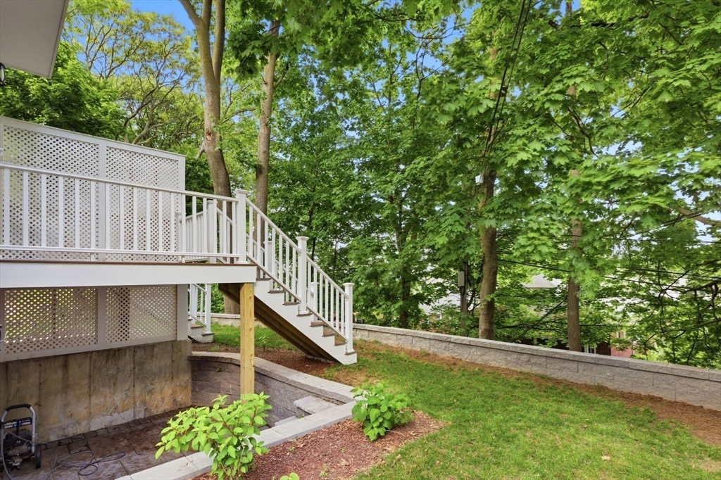 123 Nottinghill Road, Unit 2 Boston, MA 02135 - Photo 29 of 30 a balcony with wooden floor and outdoor space