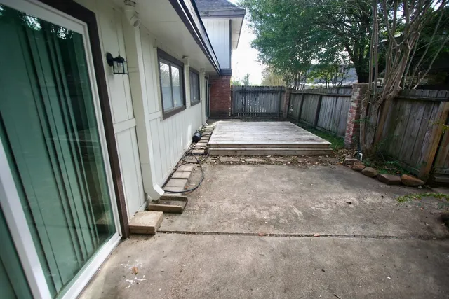 a view of a backyard with a tub