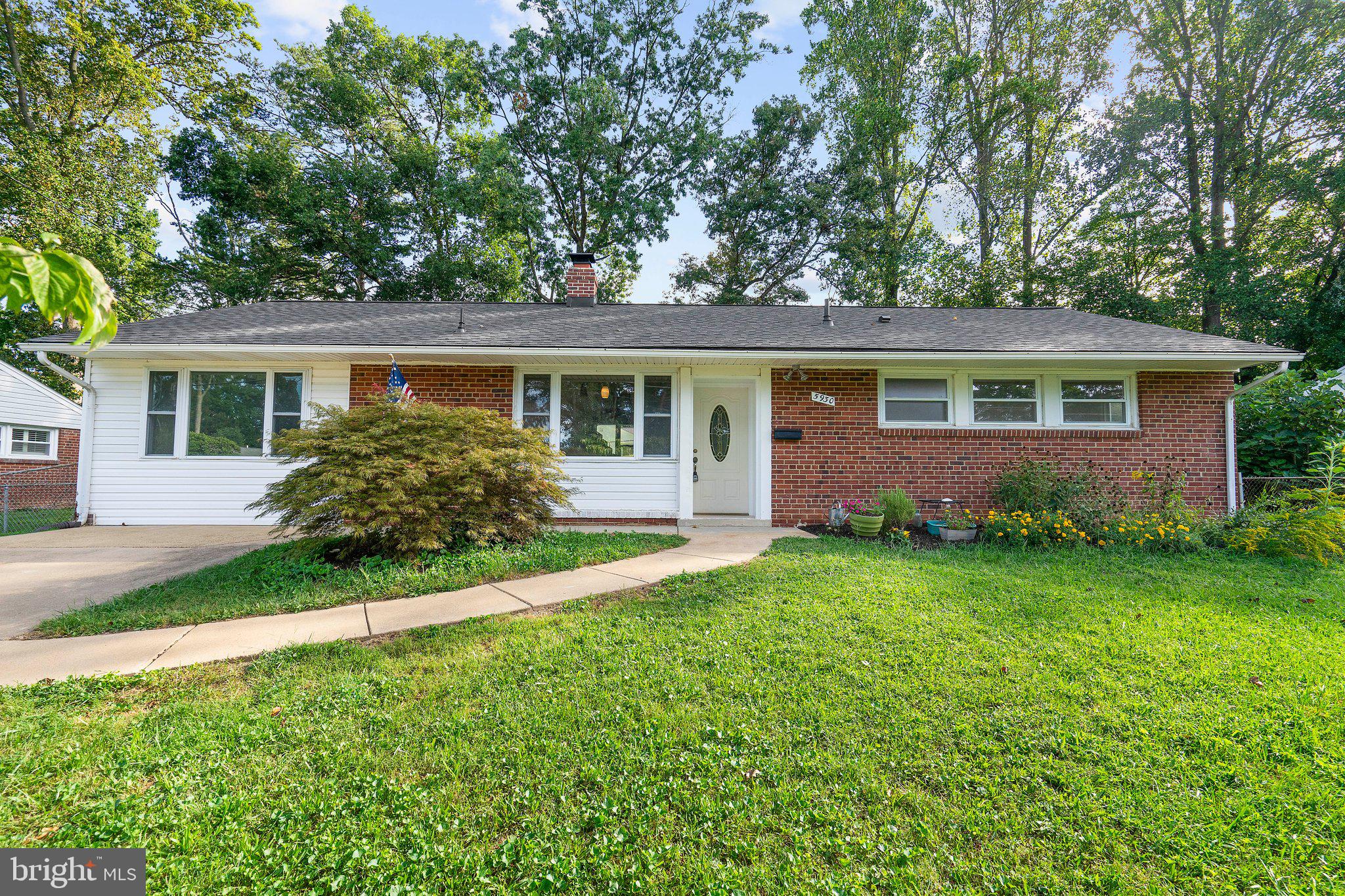 5930 Atteentee Road Springfield, VA 22150 - Photo 1 of 30 front view of a house with a yard