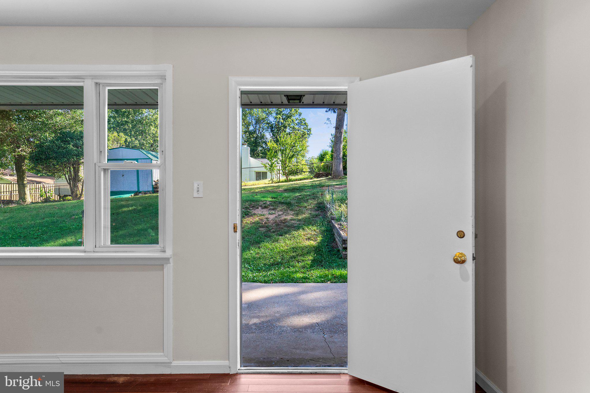 5930 Atteentee Road Springfield, VA 22150 - Photo 11 of 30 a view of a back yard from a window
