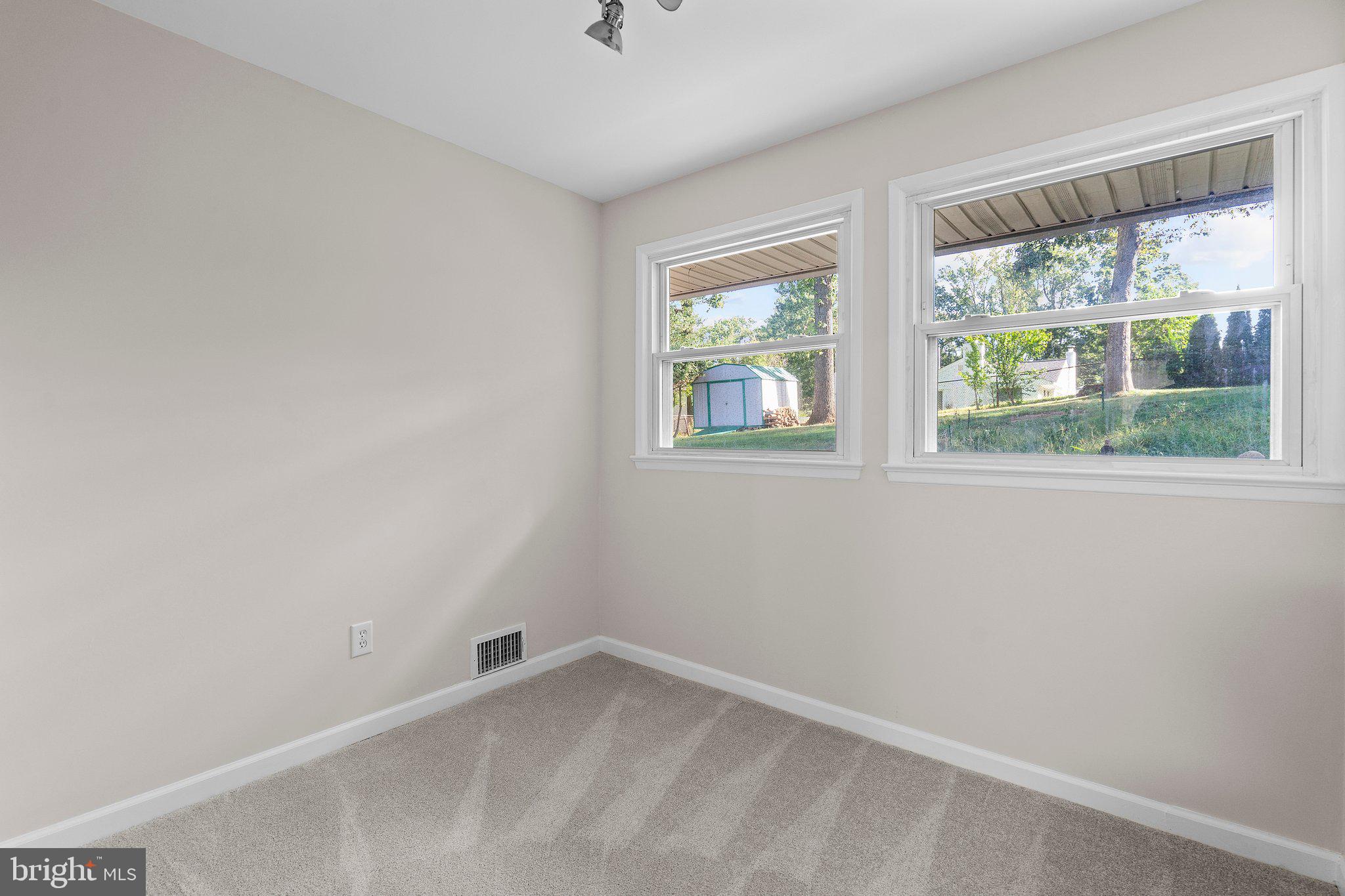 5930 Atteentee Road Springfield, VA 22150 - Photo 20 of 30 an empty room with a window