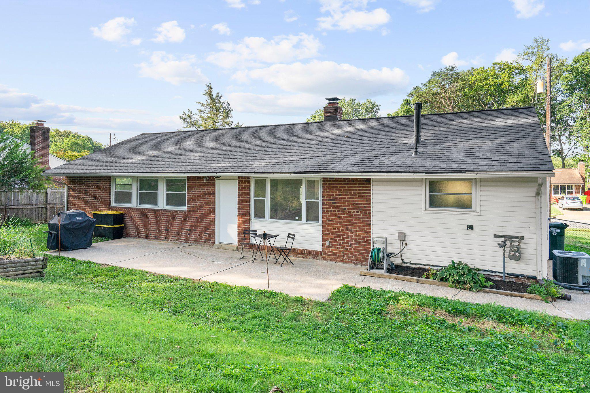 5930 Atteentee Road Springfield, VA 22150 - Photo 2 of 30 a front view of house with yard and outdoor seating