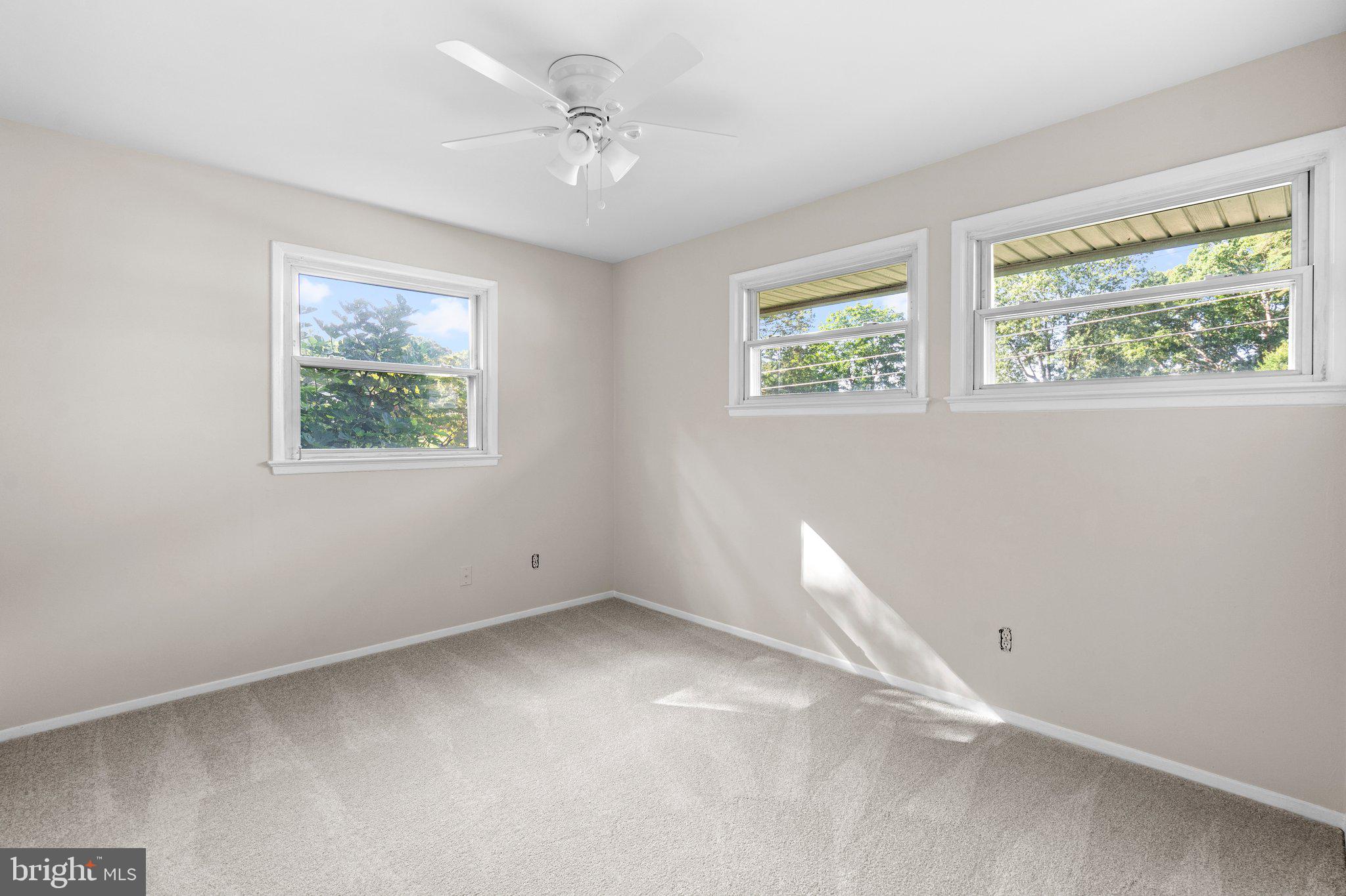 5930 Atteentee Road Springfield, VA 22150 - Photo 26 of 30 a view of room with window and ceiling fan