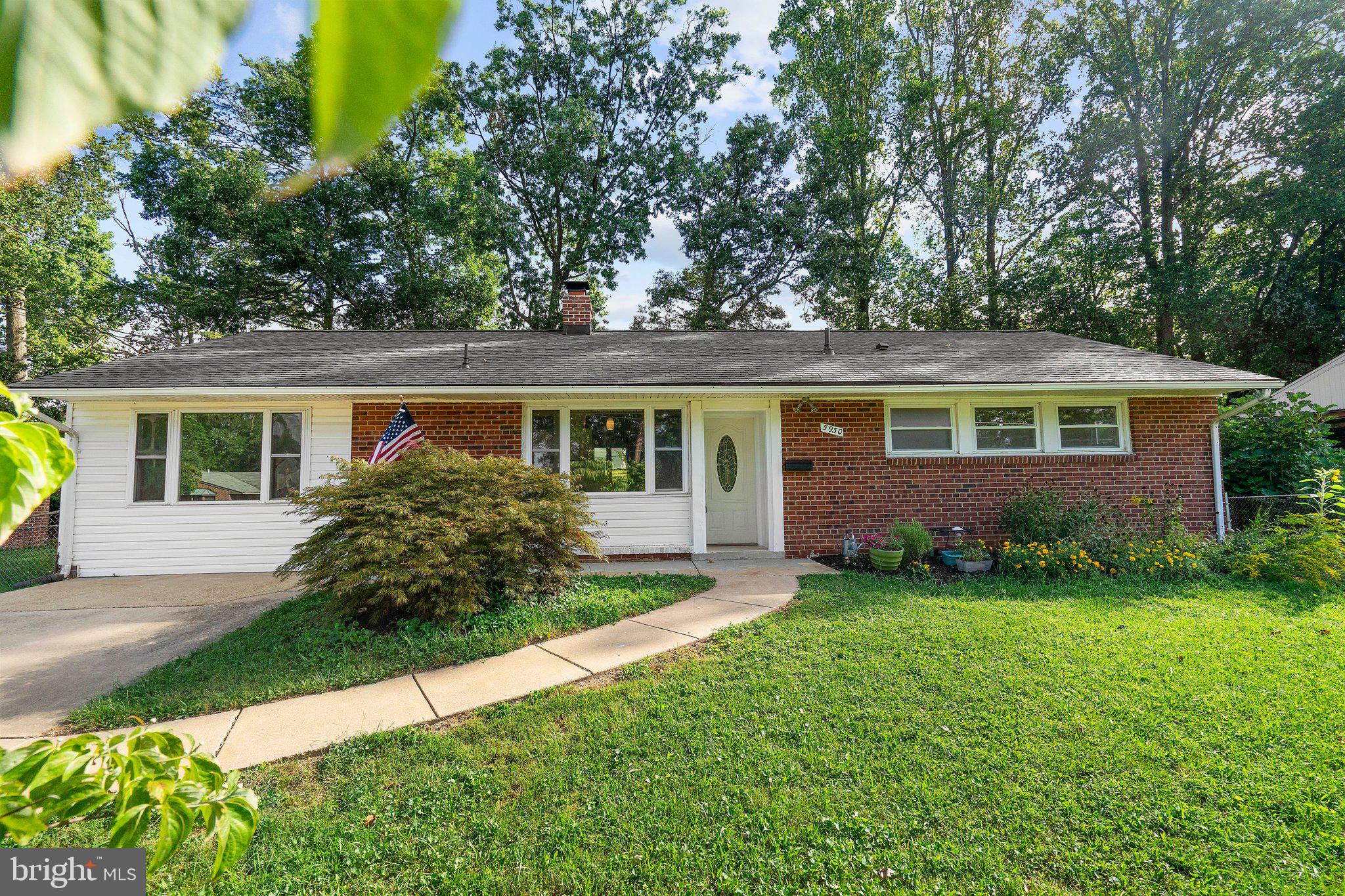 5930 Atteentee Road Springfield, VA 22150 - Photo 9 of 30 front view of a house with a yard