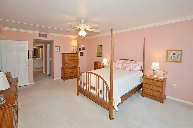 a bedroom with a bed and furniture