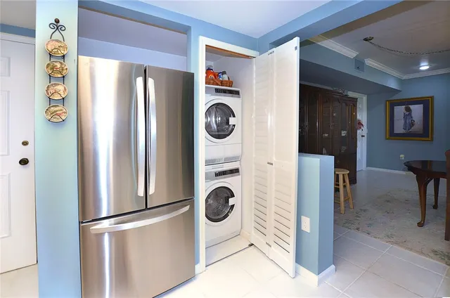 a view of a livingroom with furniture and windows