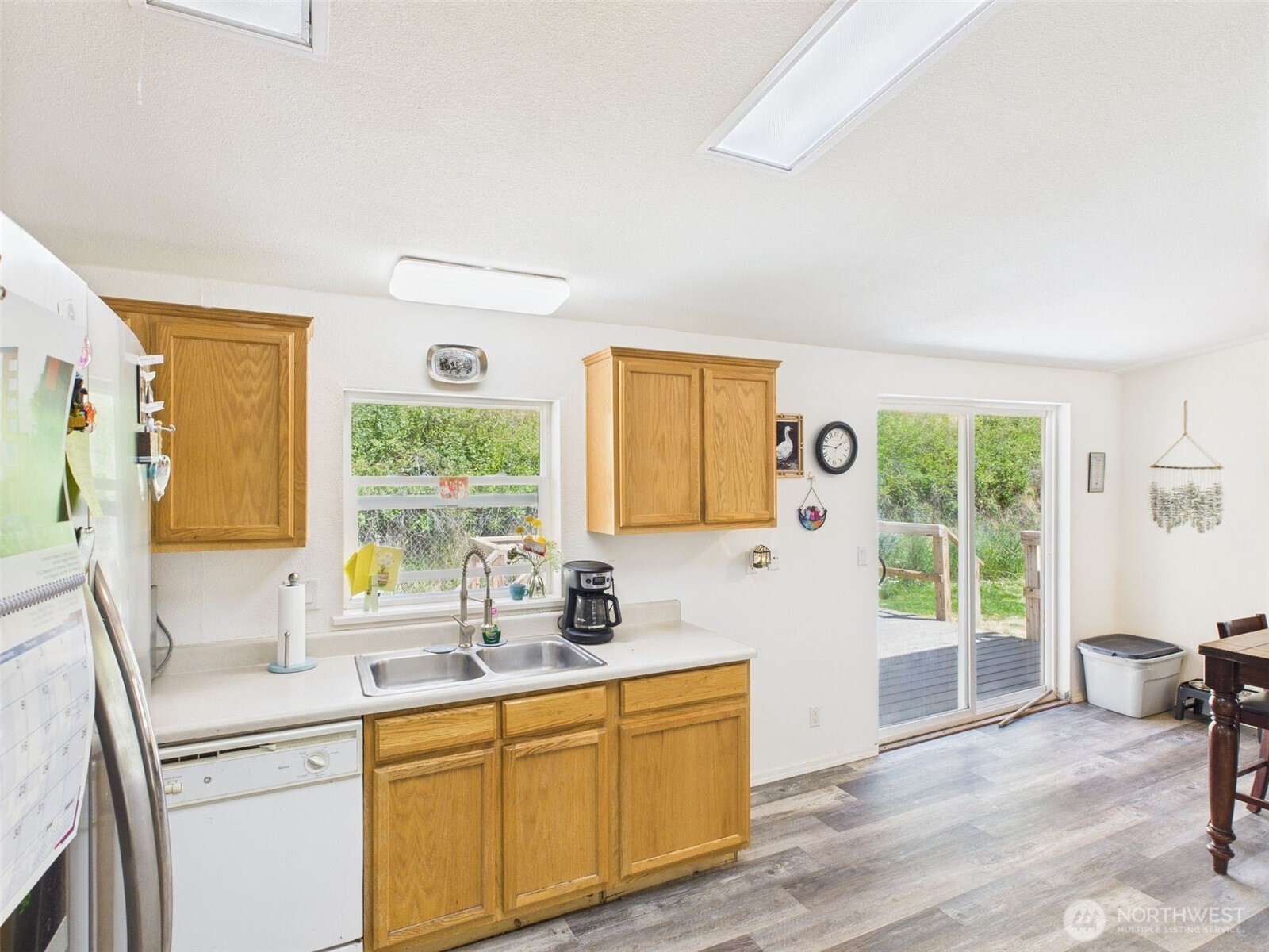 241 Wolf Fork Road Dayton, WA 99328 - Photo 18 of 40 a kitchen with a window a sink and a cabinets