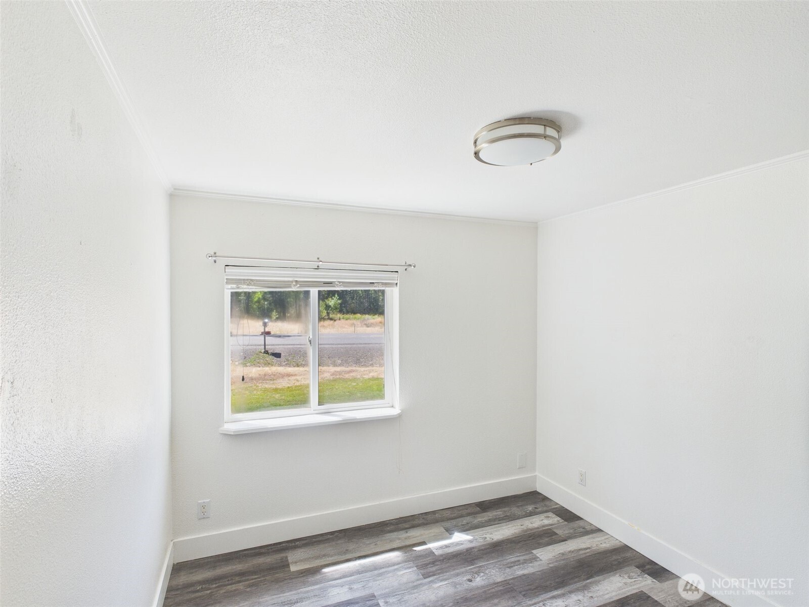 241 Wolf Fork Road Dayton, WA 99328 - Photo 27 of 40 an empty room with a window