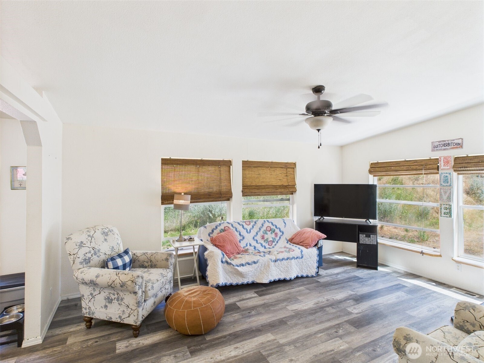 241 Wolf Fork Road Dayton, WA 99328 - Photo 30 of 40 a bedroom with a bed and wooden floor