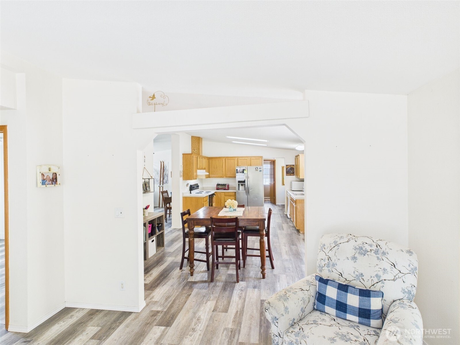 241 Wolf Fork Road Dayton, WA 99328 - Photo 32 of 40 a dining room with furniture and wooden floor