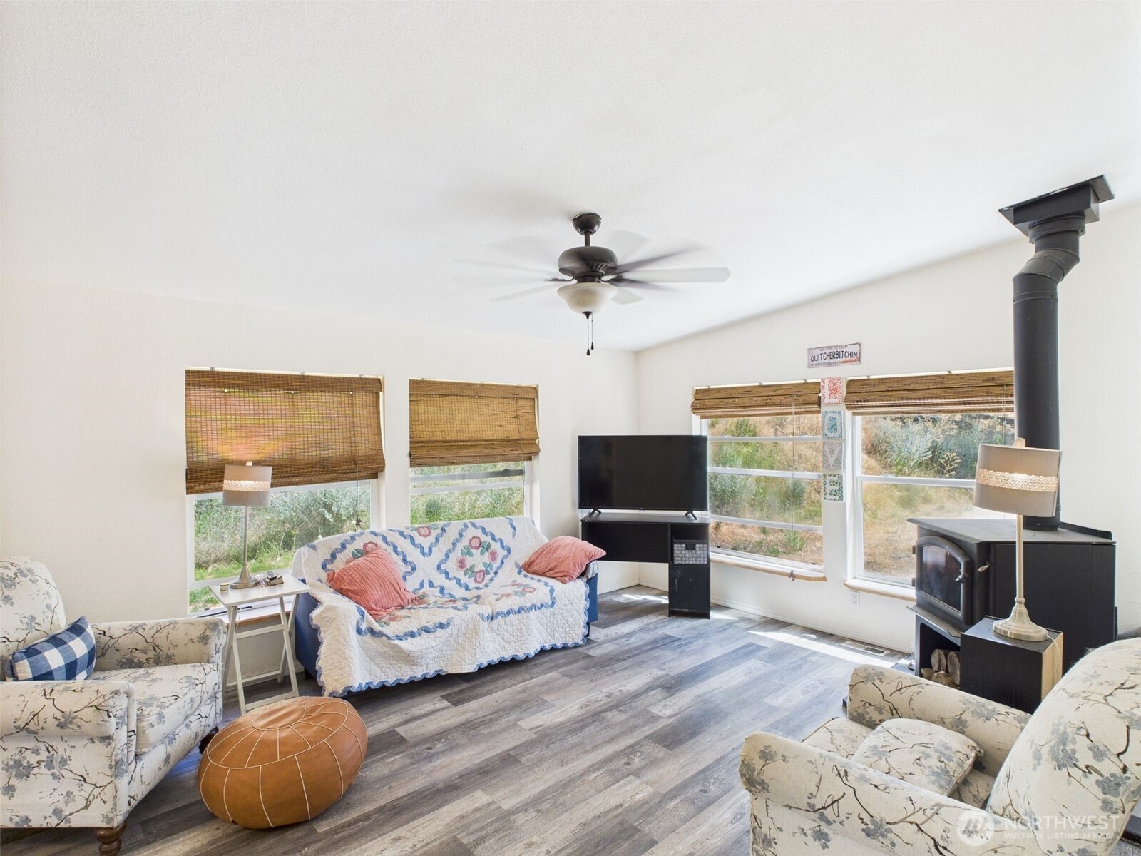 241 Wolf Fork Road Dayton, WA 99328 - Photo 4 of 40 a bedroom with furniture and a large window
