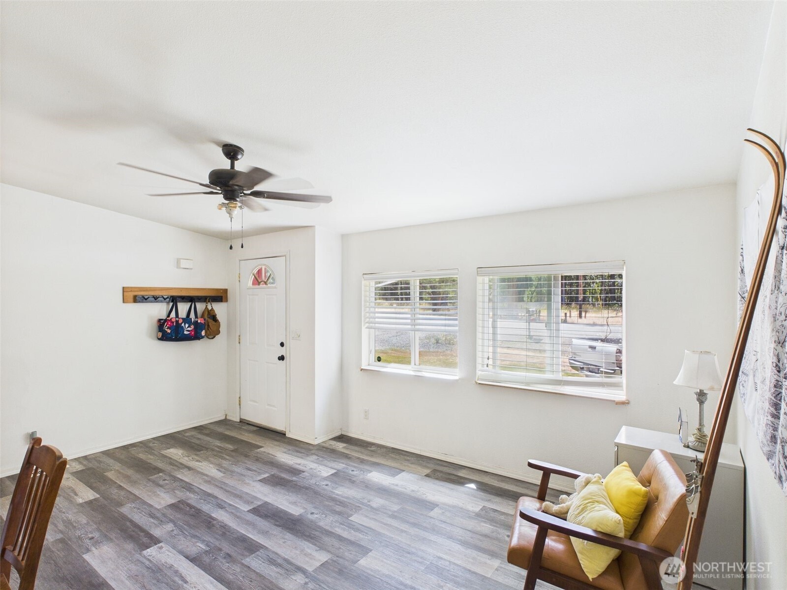 241 Wolf Fork Road Dayton, WA 99328 - Photo 7 of 40 a view of a workspace with furniture and a window