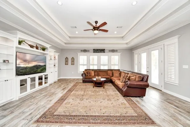 a living room with furniture or couch and a table