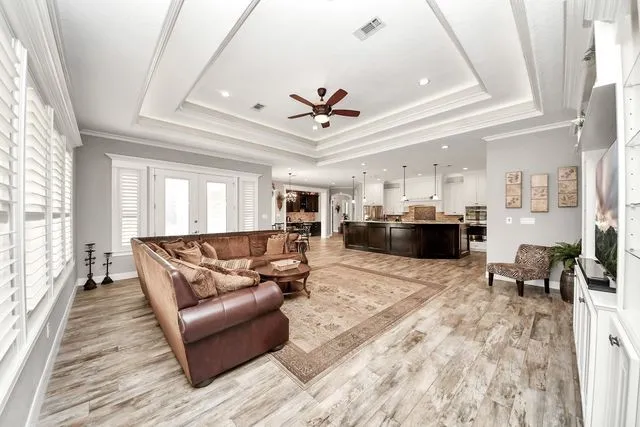 a view of a hallway and dining room