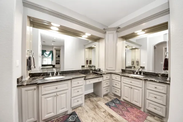 a spacious bathroom with a bathtub and a window
