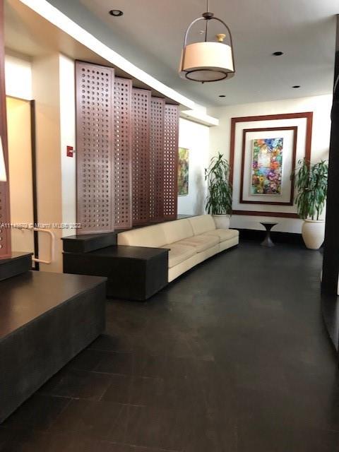 1500 Bay Road, Unit 958S Miami Beach, FL 33139 - Photo 13 of 20 a bedroom with bed and window