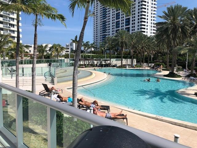 1500 Bay Road, Unit 958S Miami Beach, FL 33139 - Photo 20 of 20 a view of swimming pool from a patio