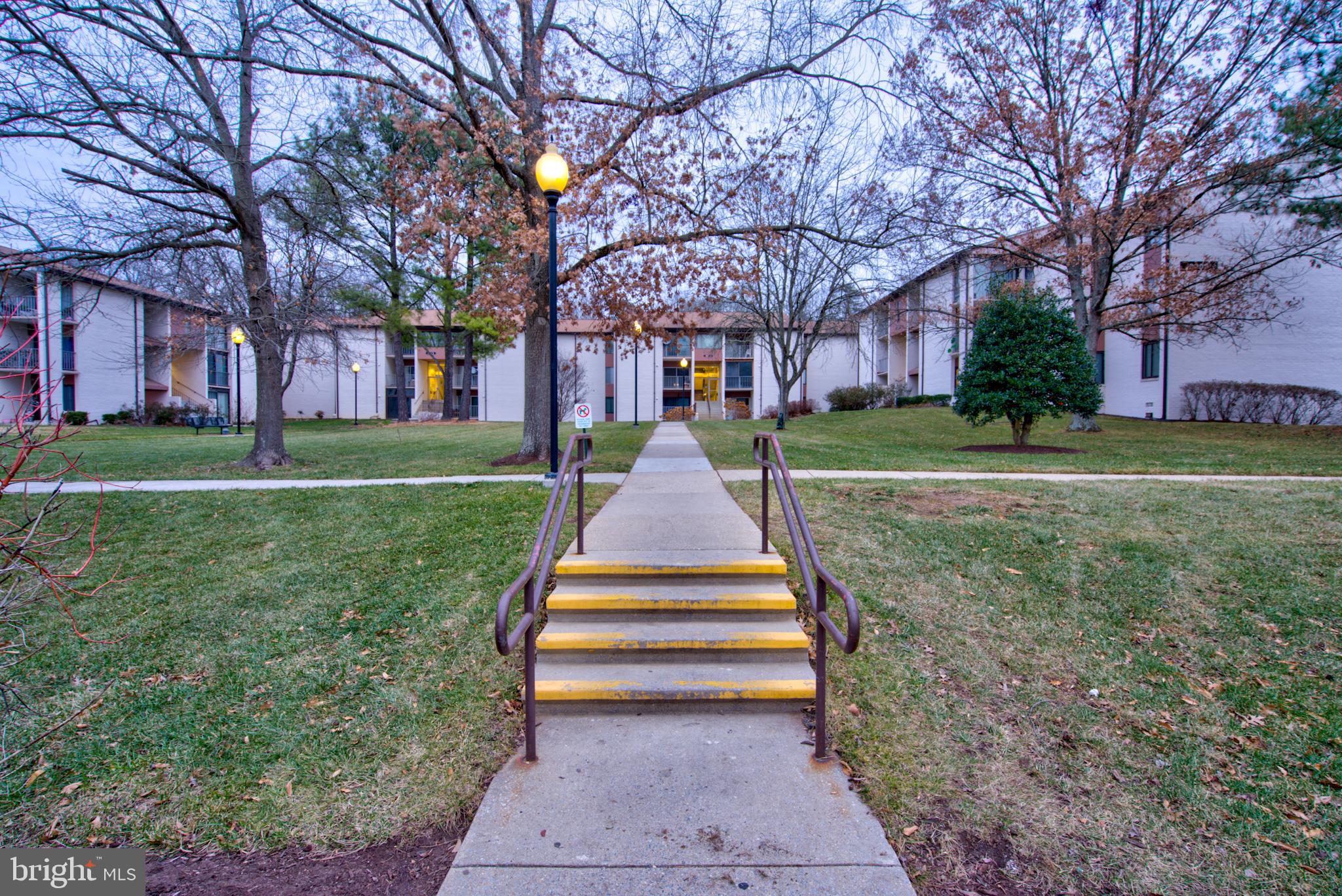 8011 Mandan Road, Unit 201 Greenbelt, MD 20770 - Photo 2 of 28 a park with large trees