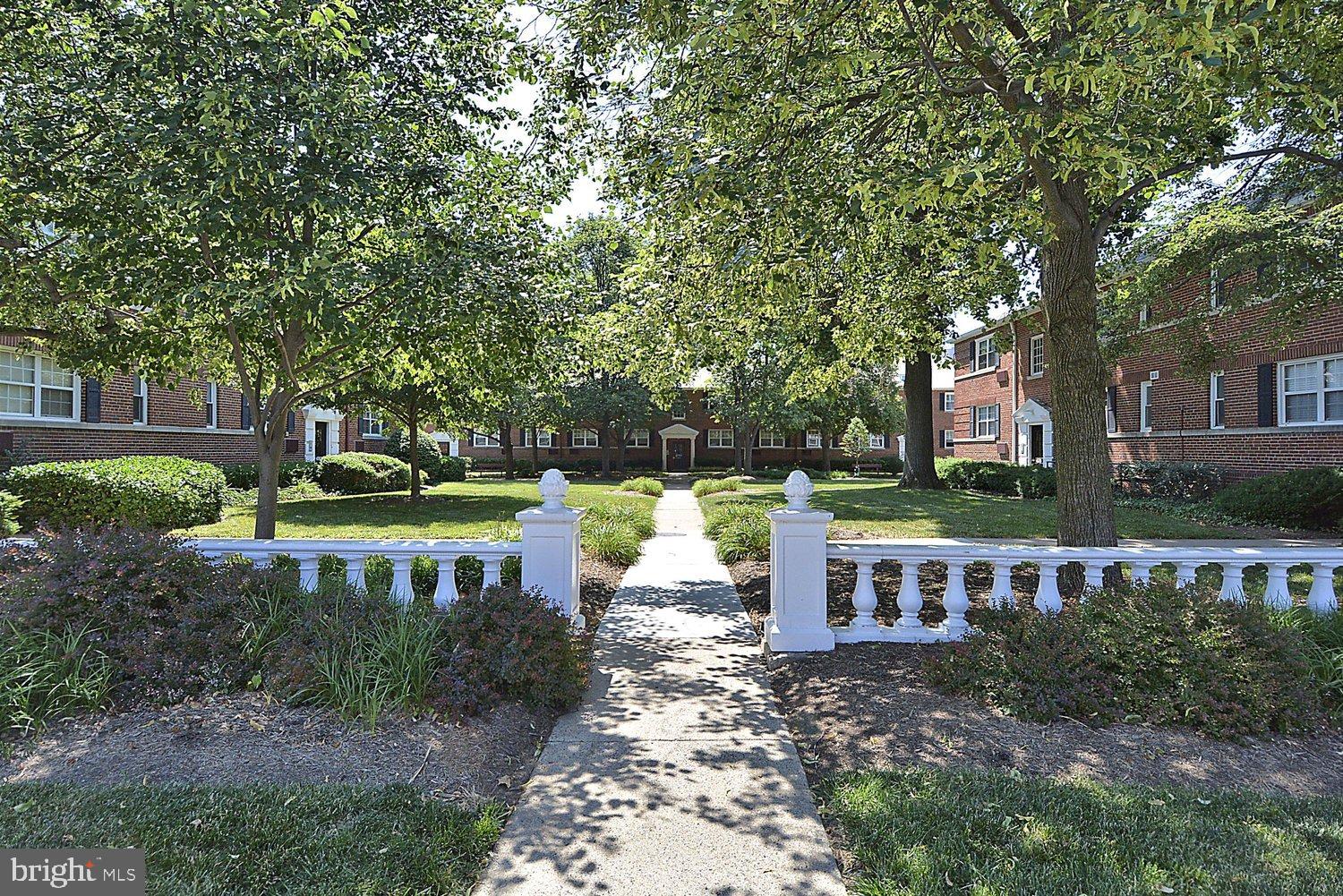 4312 2nd Road North, Unit 2 Arlington, VA 22203 - Photo 34 of 66 Charming pathway through lush greenery.