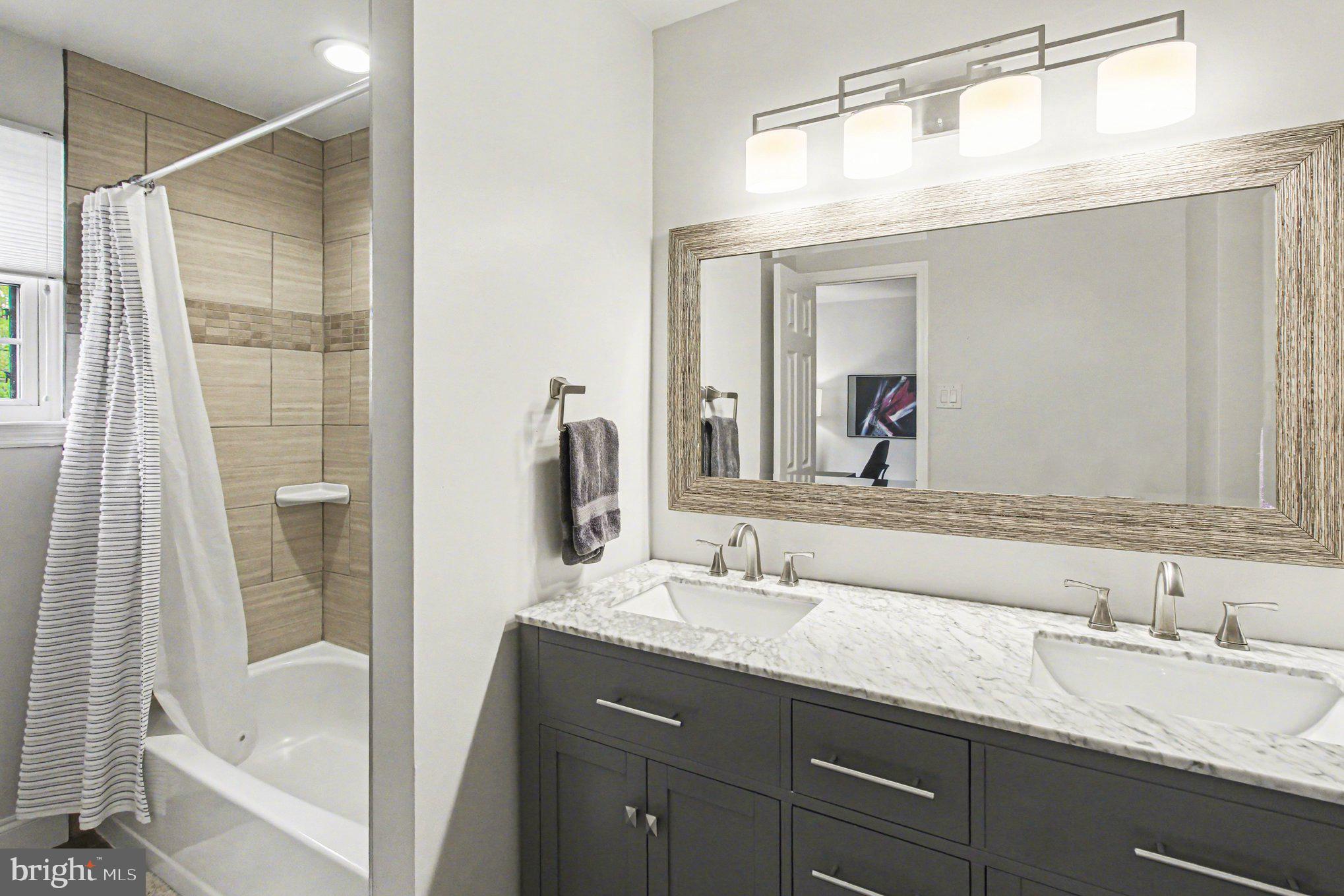 3402 Keswick Way Newtown Square, PA 19073 - Photo 16 of 29 Modern elegance in a serene bathroom.