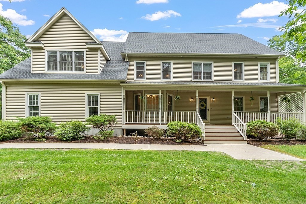 6 Farrar Road Upton, MA 01568 - Photo 1 of 42 a front view of a house with a yard